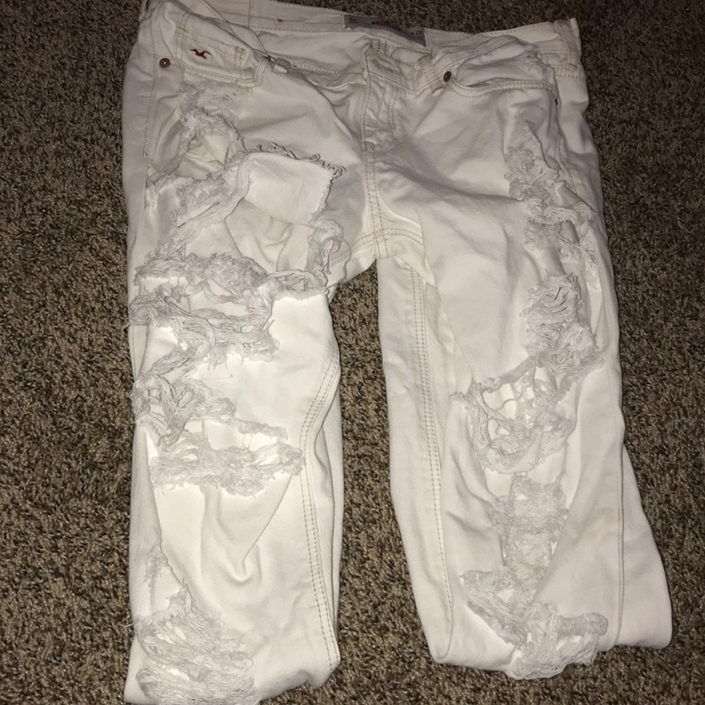 white pants with rips